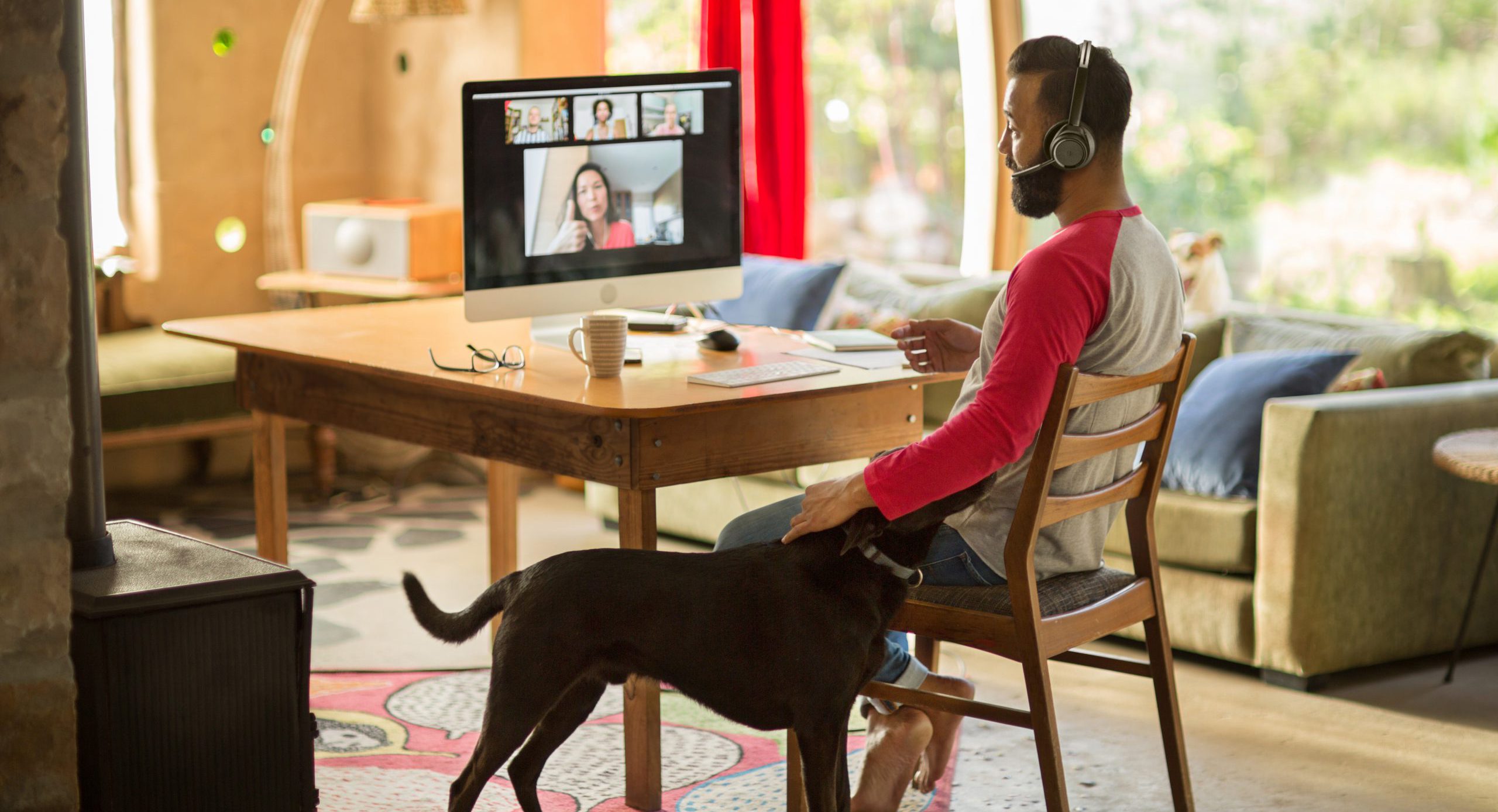Man working from home with dog